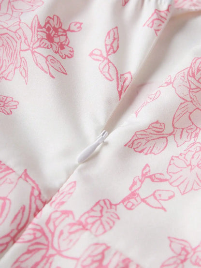 Elegant Pink Floral Print Dress with Thin Straps and a Flared Waist